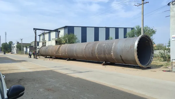 Long cylindrical vessel outside the workshop